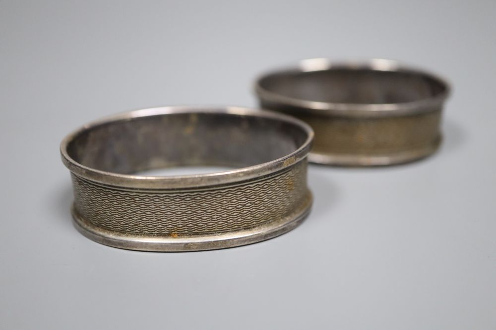 Six Hong Kong sterling dishes, with inset coin and three napkin rings.